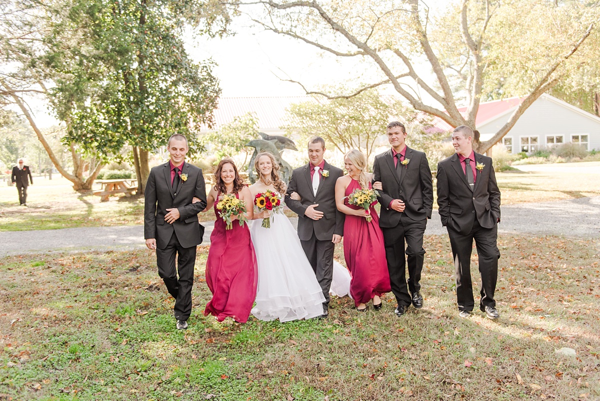 deltaville-wedding-firefighters-with-fall-sunflowers-and-roses-27
