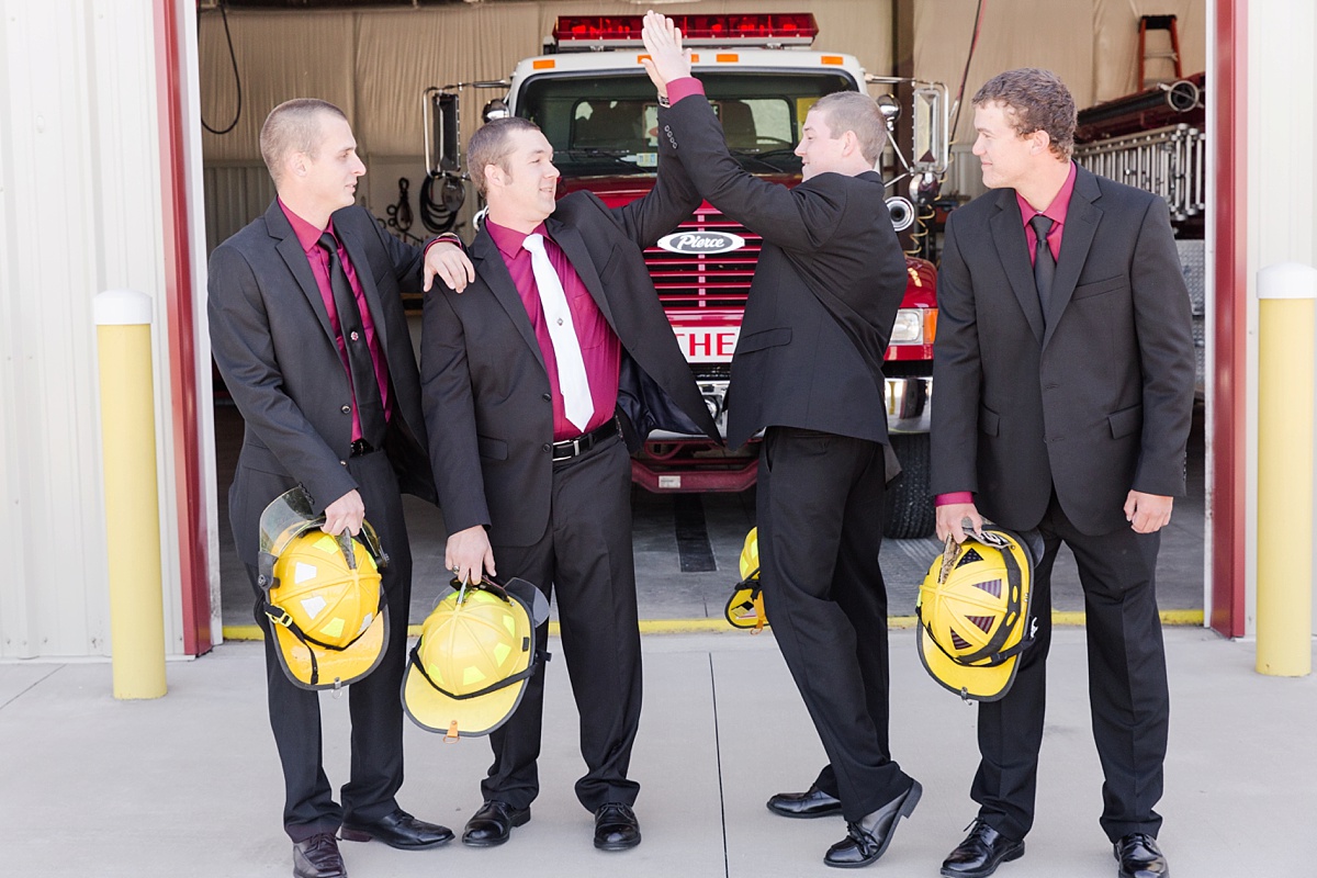 Deltaville Firefighter Wedding with red roses 