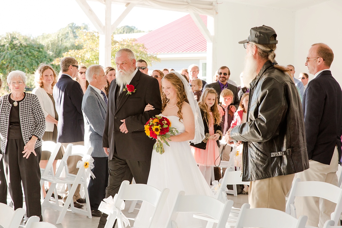 deltaville-wedding-firefighters-with-fall-sunflowers-and-roses-73