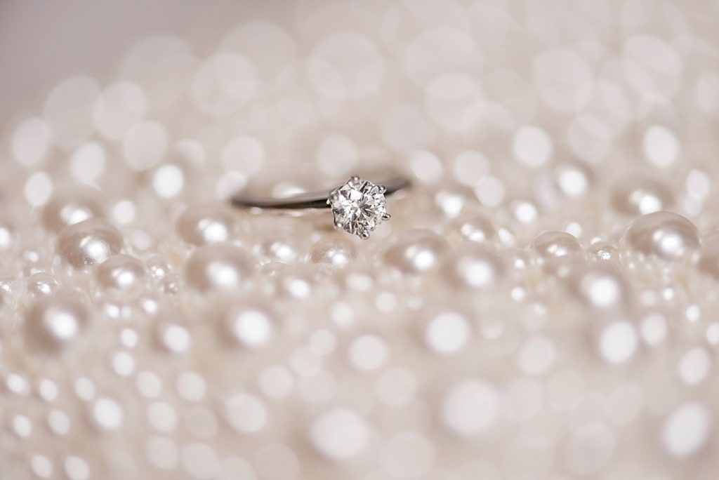 Tiffany ring on pearl bridal purse