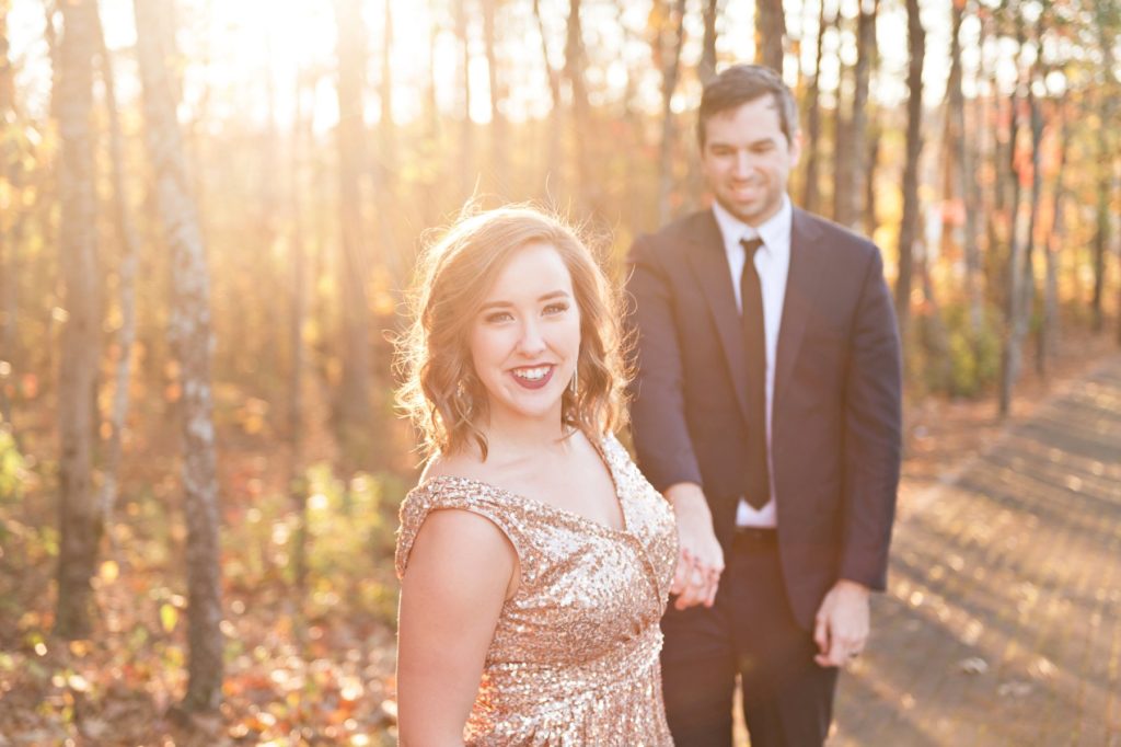 Couple with girl wearing gold sequin dress