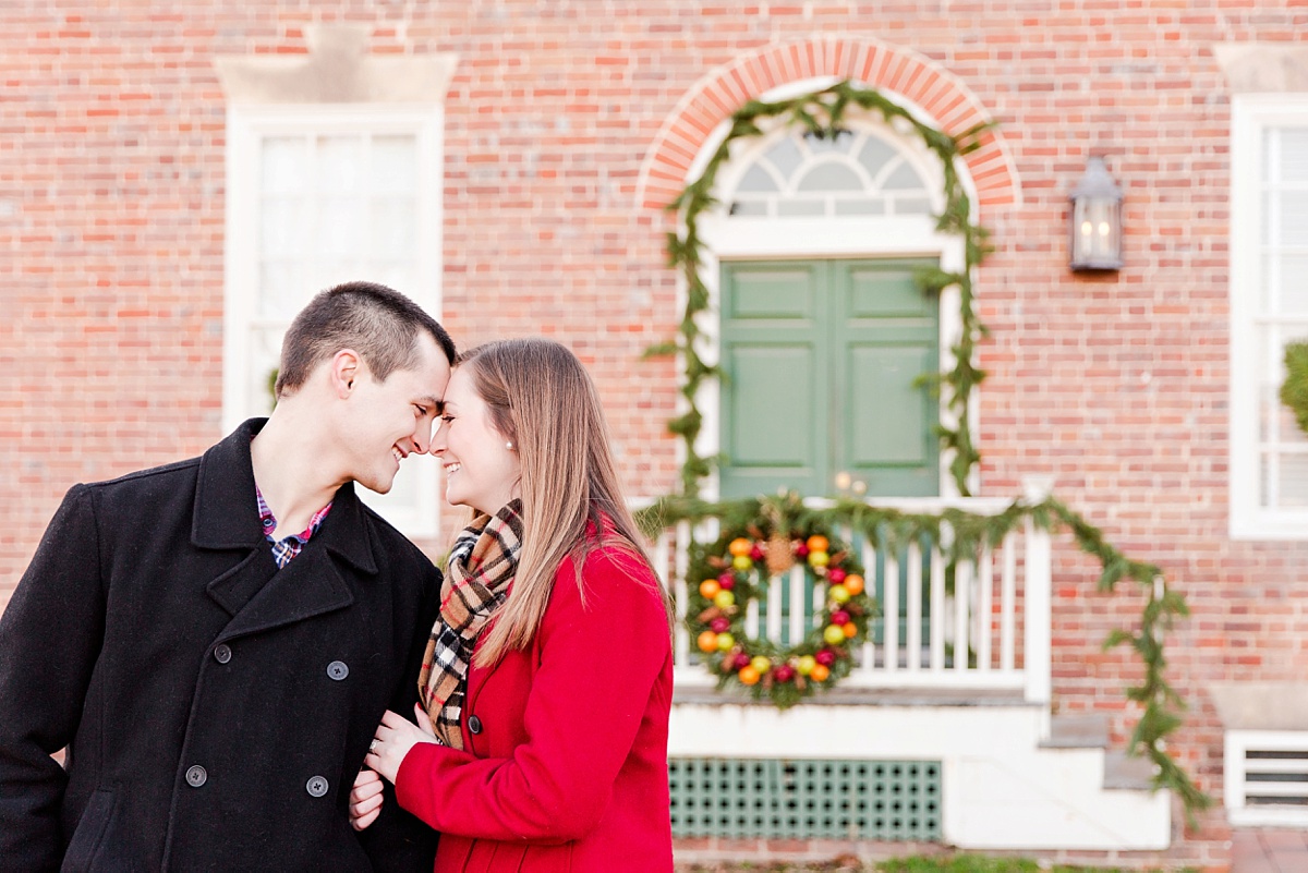 Colonial Williamsburg Burberry plaid and red Christmas Engagement Session