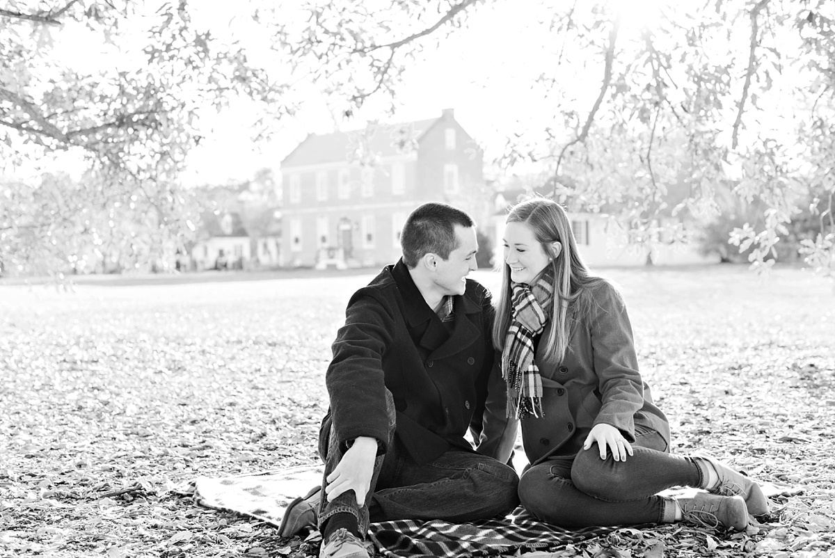 Red and plaid Christmas Engagement Session Williamsburg Colonial