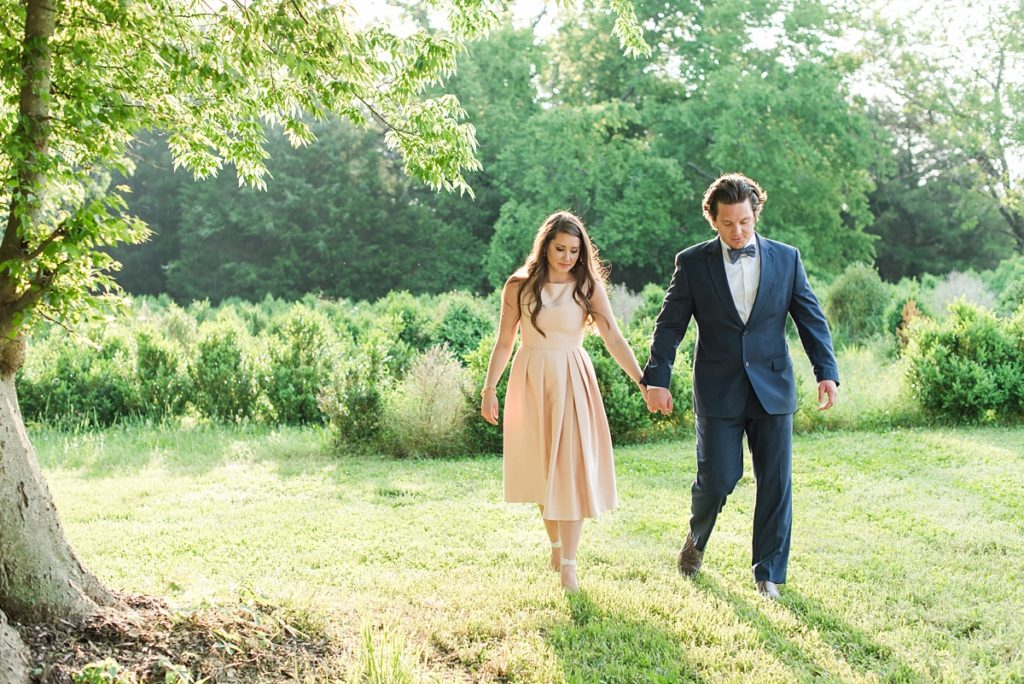 Pink dress and navy suit with bowtie engagement session