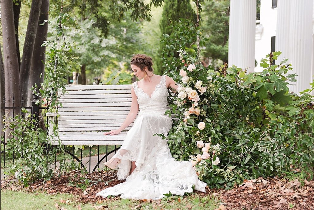Porch swing with bride and roses