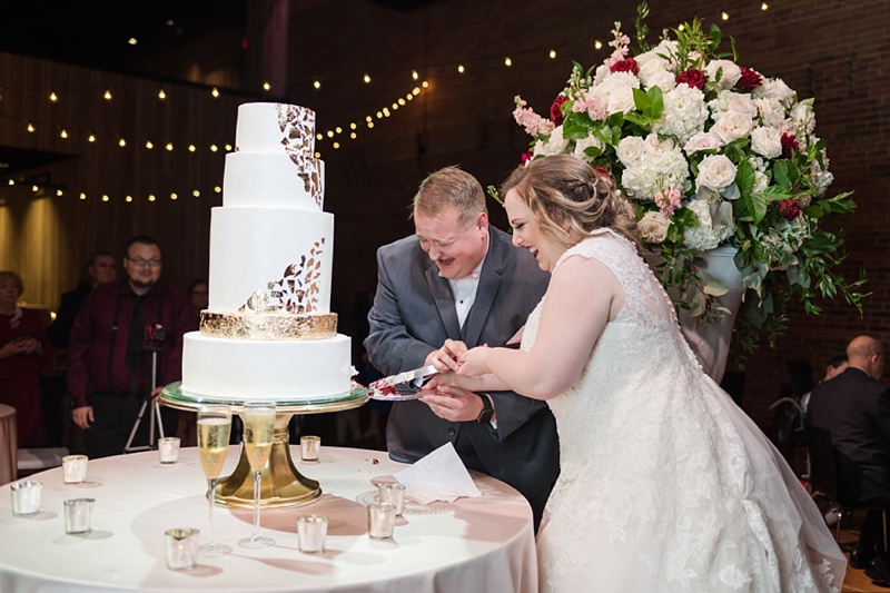 Cake cutting for winter wedding at Alley Station
