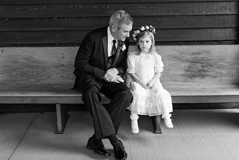 Grandfather at wedding with granddaughter at wedding