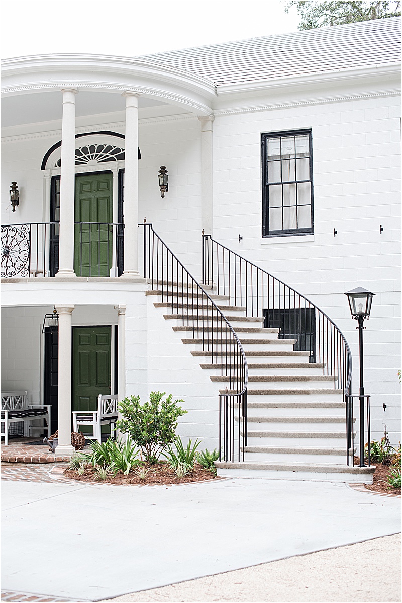 Historic Wedding Venue Holly Oaks on the salt-marsh in Savannah with southern green doors and a double staircase.