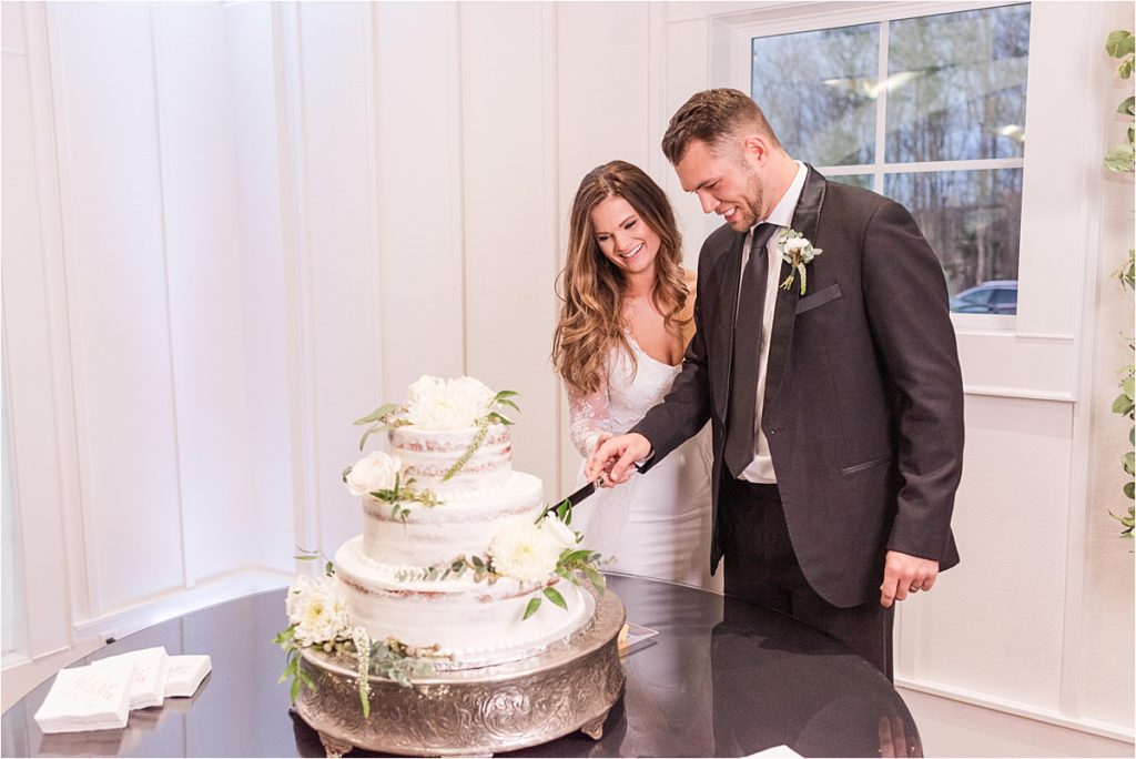 Cutting the cake in heirloom gown