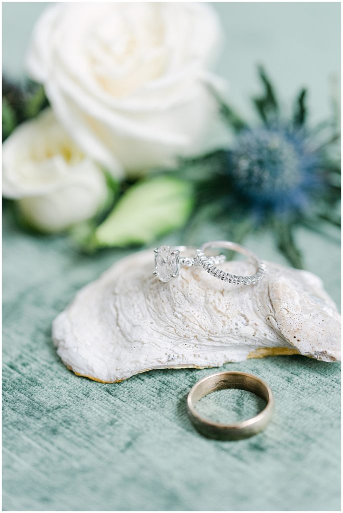 Wedding day detail with oyster shell and flowers styled by Grey Harper