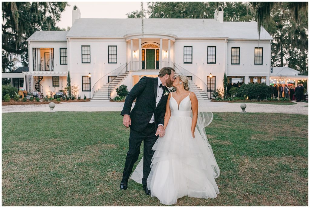 Wedding in front of historic estate in Savannah with a wedding day stylist.