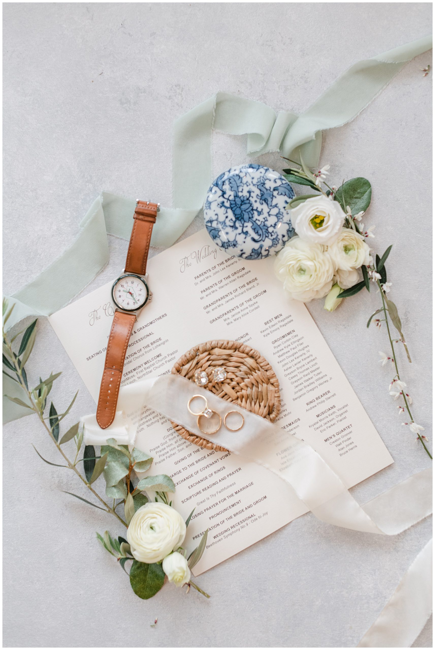 Grooms watch and rings at estate wedding