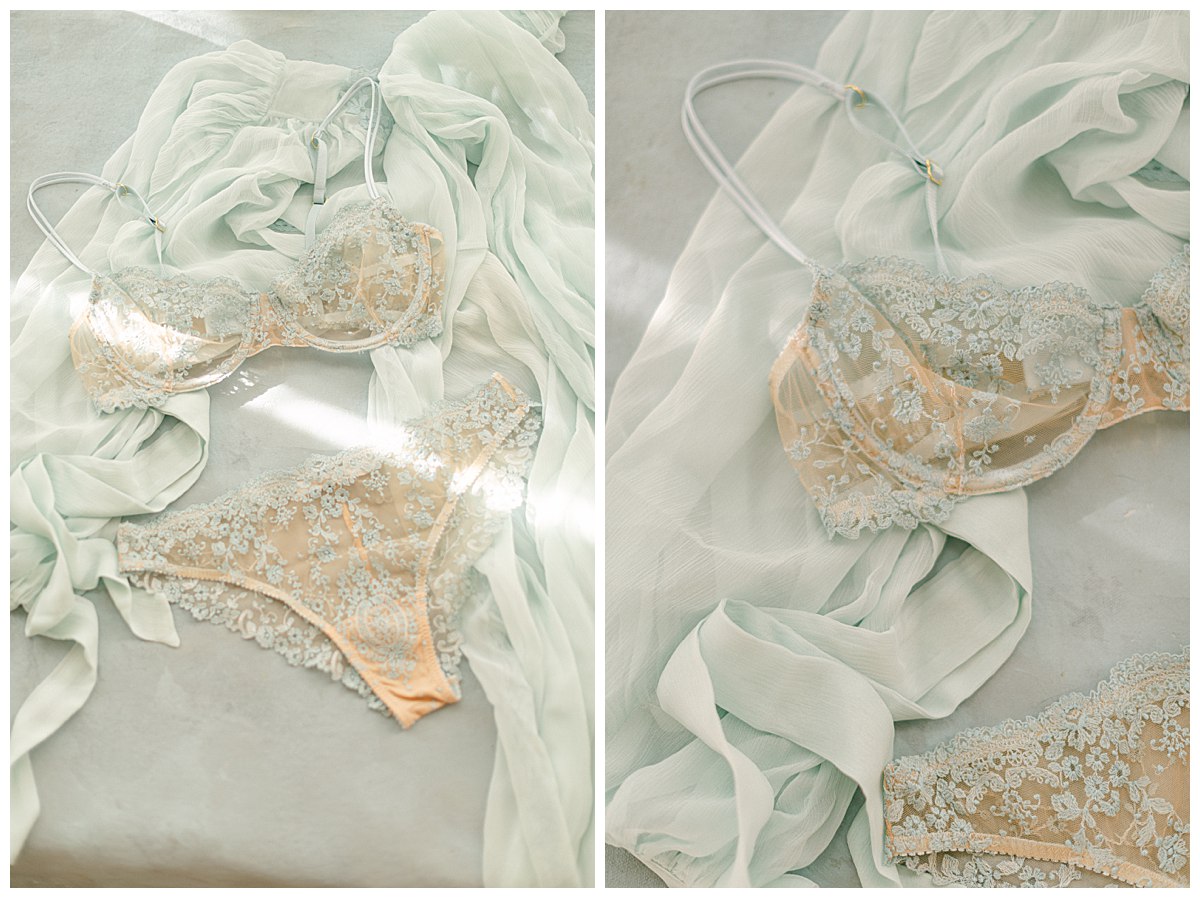 flat lay of a blue and cream lace bra and underwear with a light blue robe