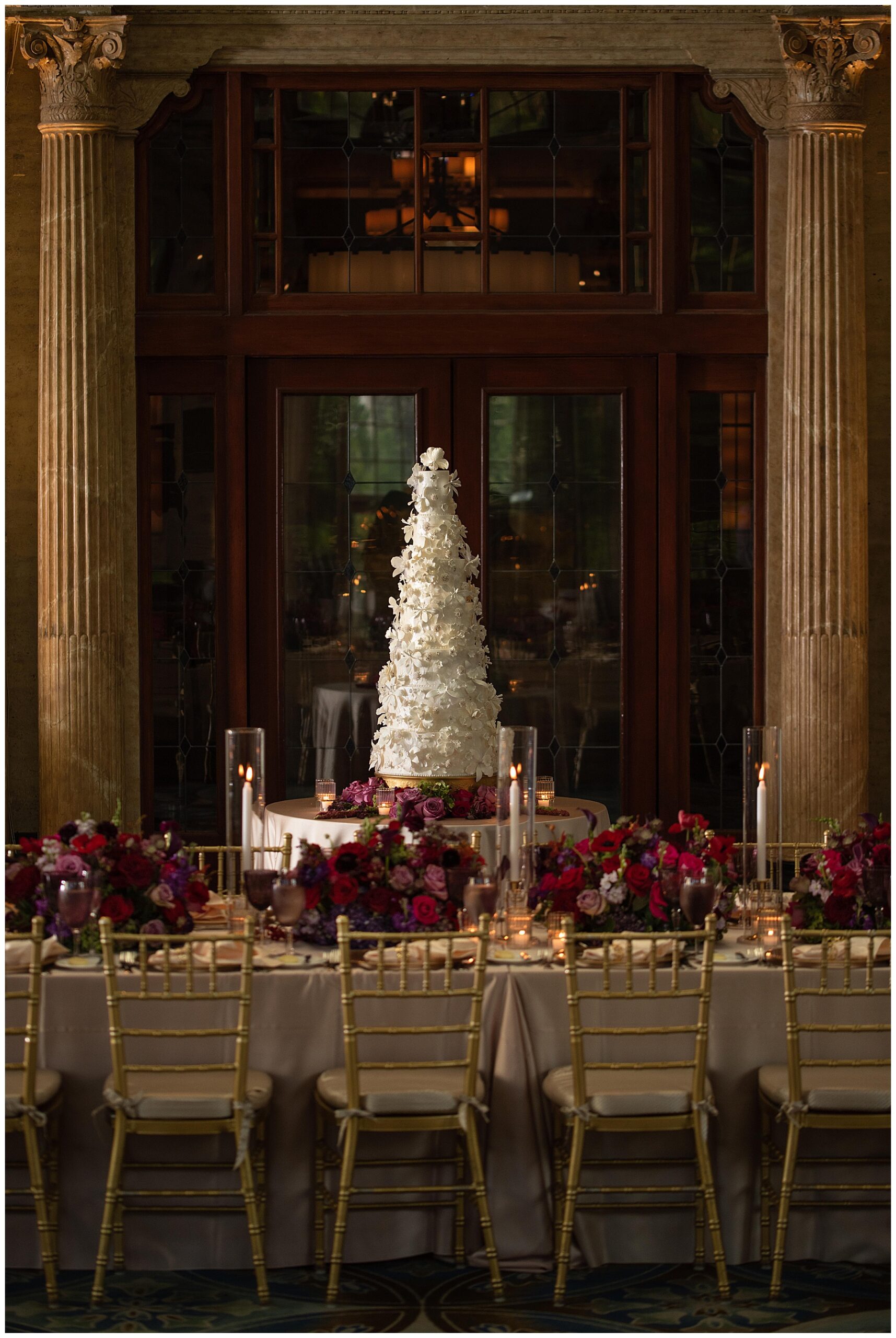 Dramatic cake in the circle ballroom at the breakers for a west palm beach wedding